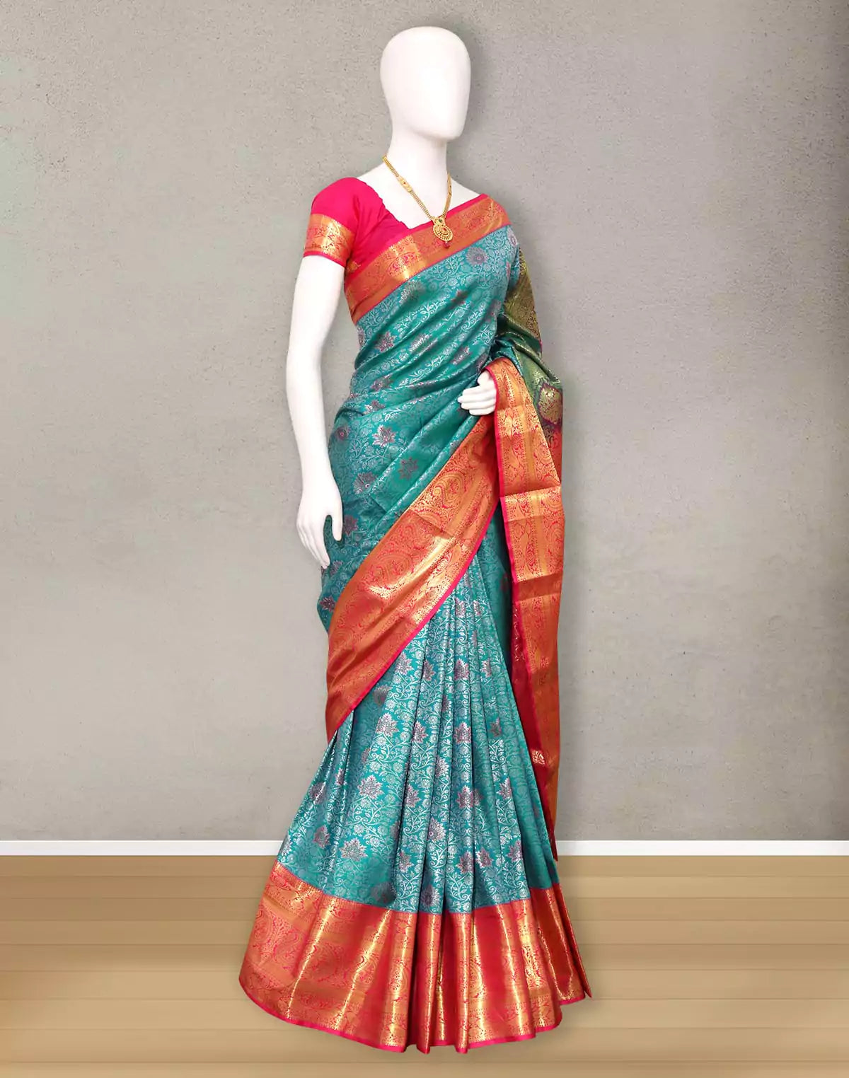 Rama Green all over Floral Silver zari Contrast Border Saree