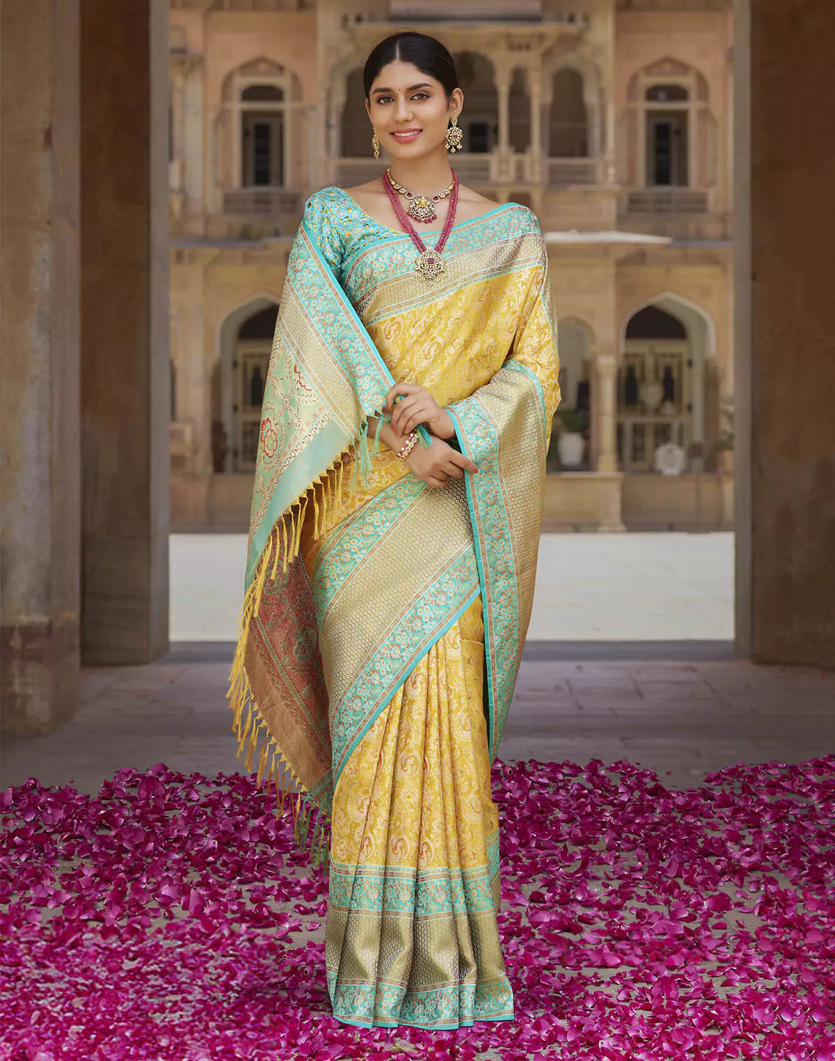 Yellow Ethnic Motifs Kanchipuram Pure Silk Saree With Contrast Skut Border