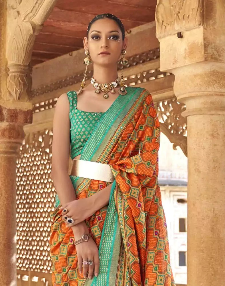 Fascinating Orange Geometric Print Patola Saree
