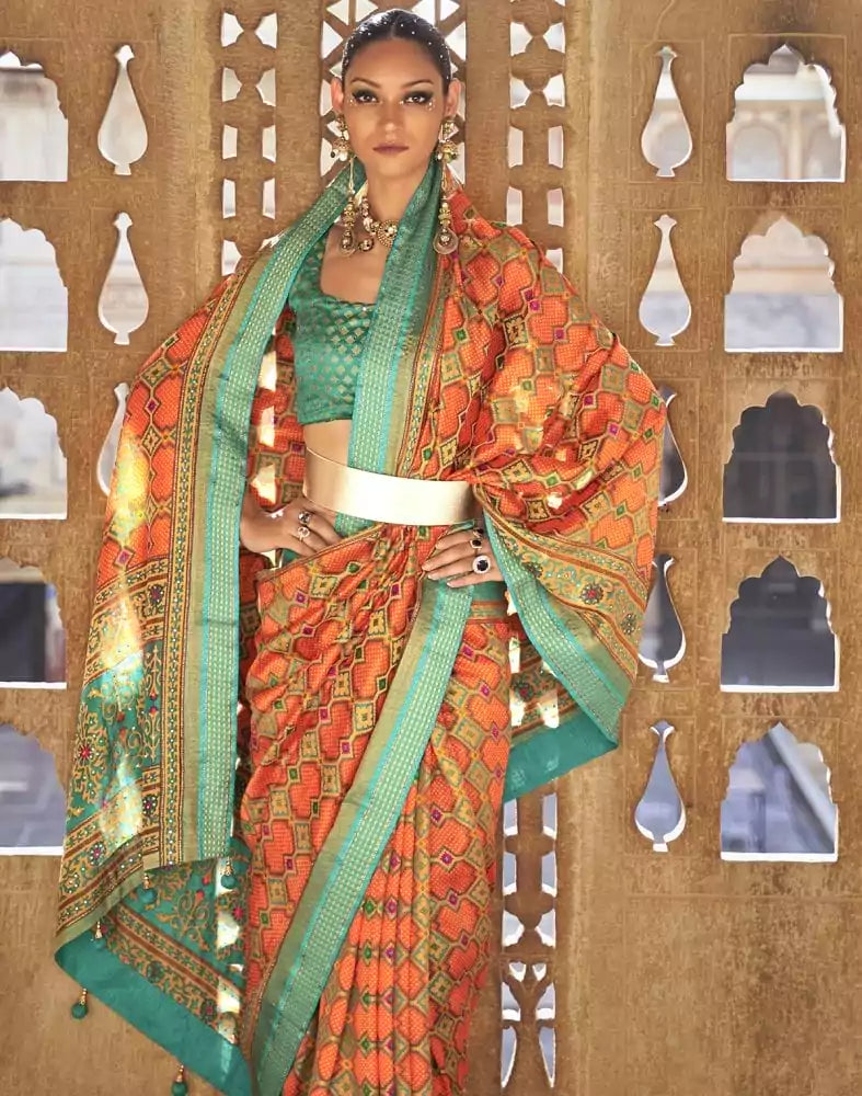 Fascinating Orange Geometric Print Patola Saree