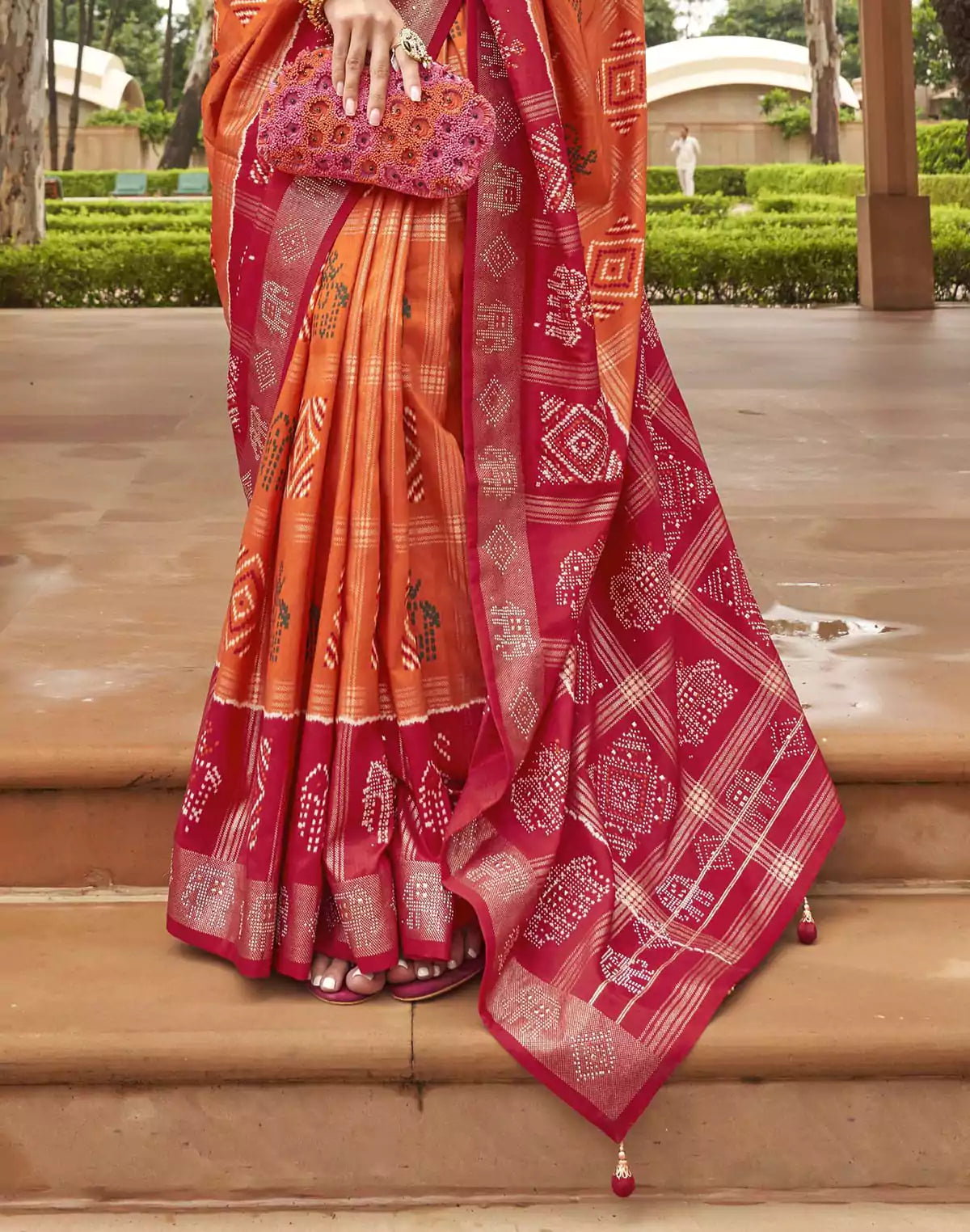 Orange Patola Silk Contrast Border Saree