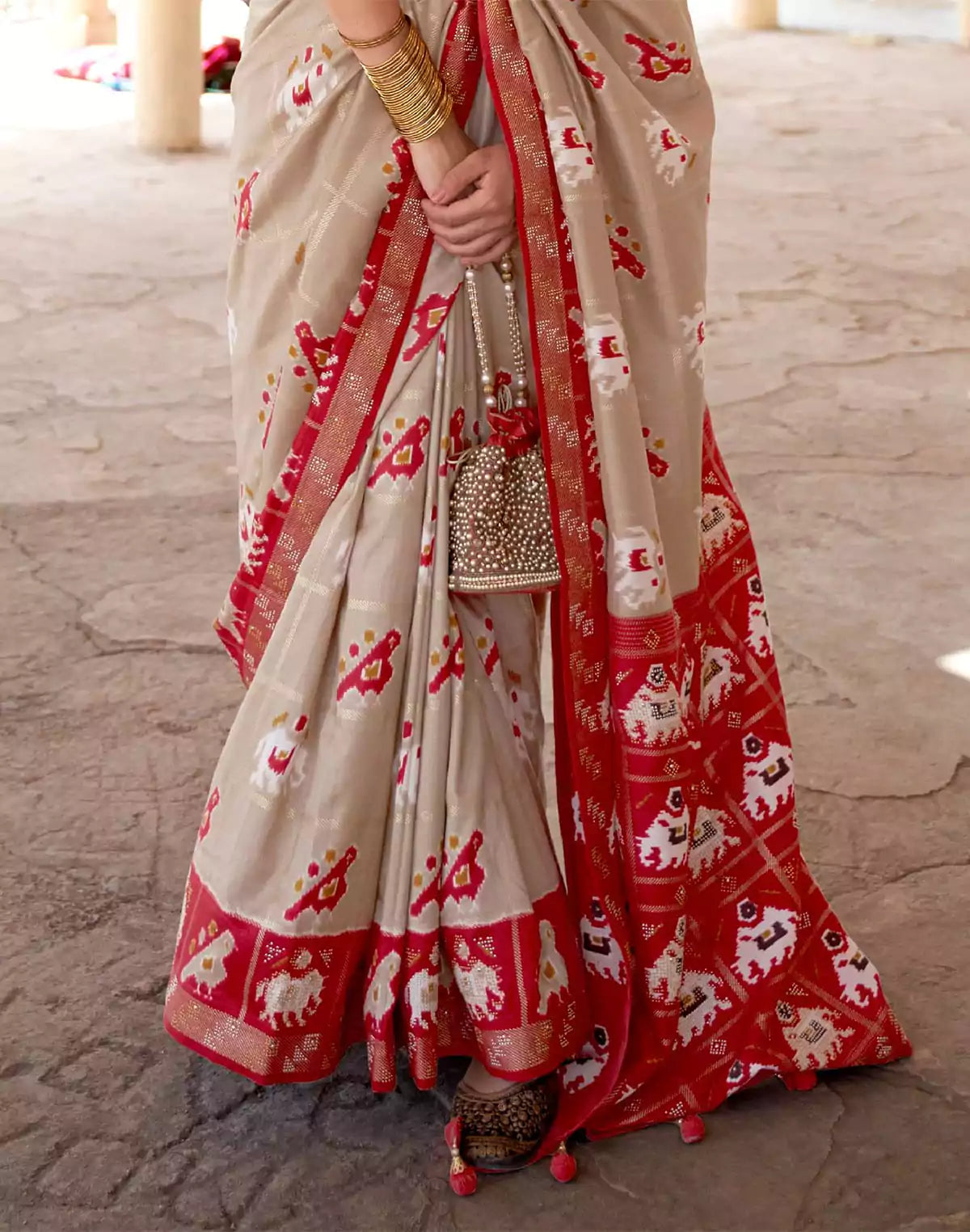 Elegant Beige Woven Design Patola Saree
