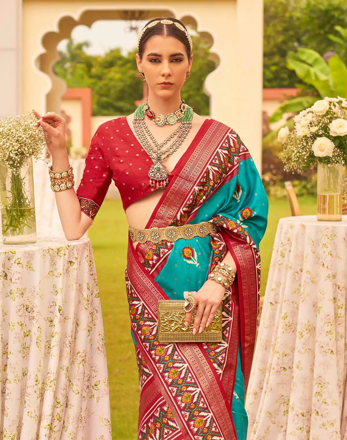 Dazzling Teal Blue Patola Print Trendy Saree