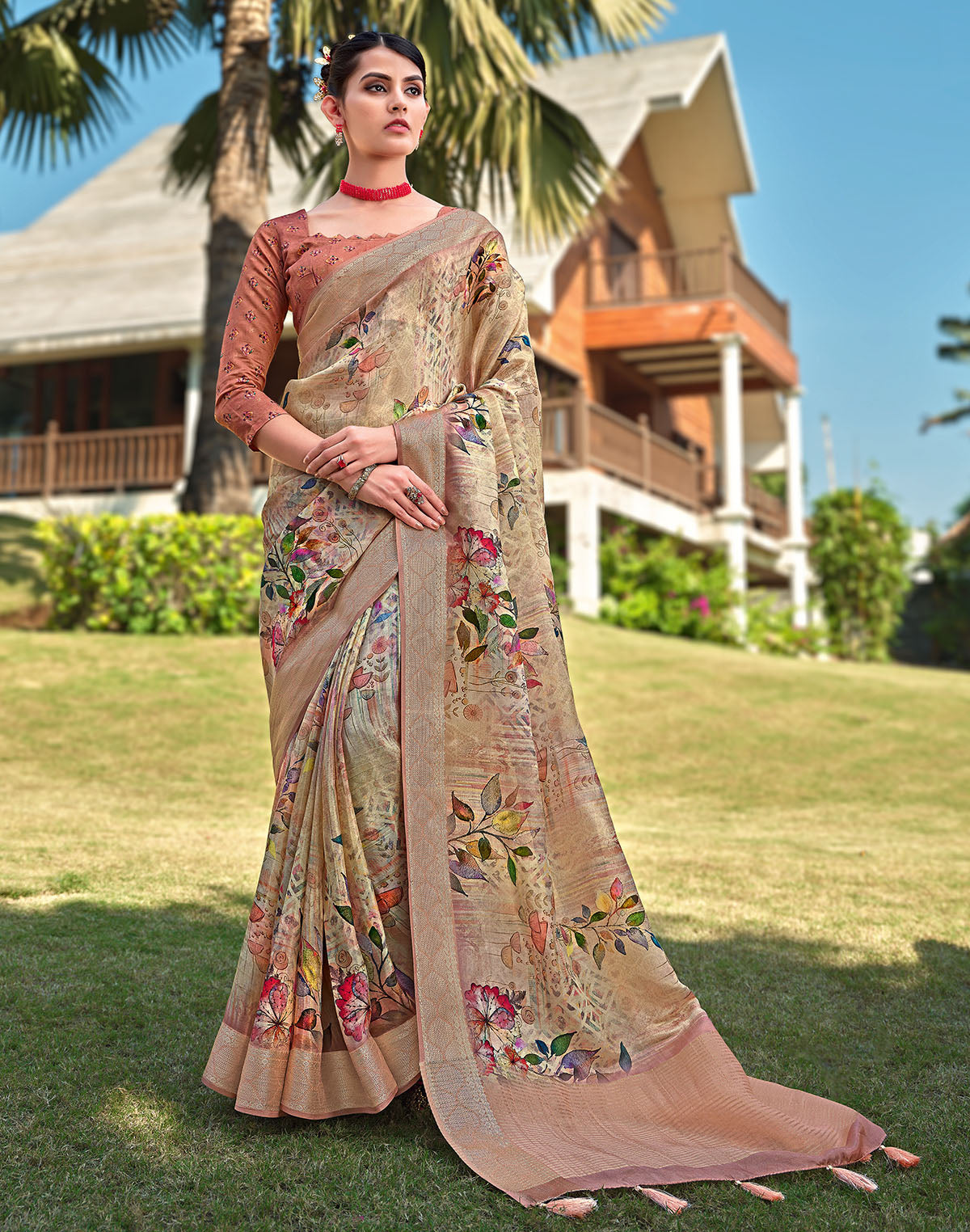 Attractive Light Orange Dola Silk Floral Design Saree