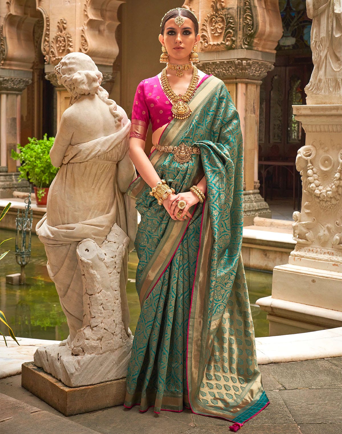 Teal Green Floral Banaras Patola Silk Saree