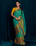 Green Brasso Silk Saree With Raw Silk Embroidered Yellow Blouse