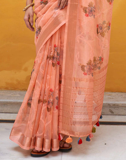 Peach Organza Floral Print Saree With Tussels and Contrasting Blue Blouse