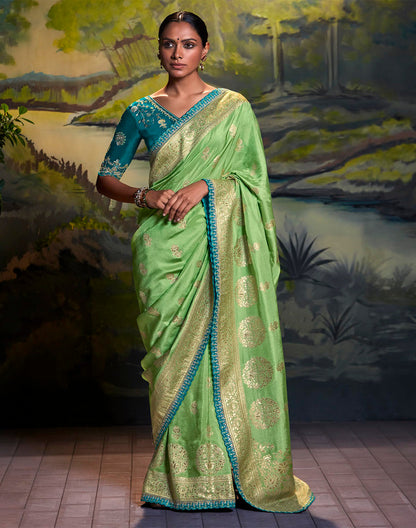 Pista Green Pure Dola Silk Saree With Designer Blue Embroidery Work Blouse