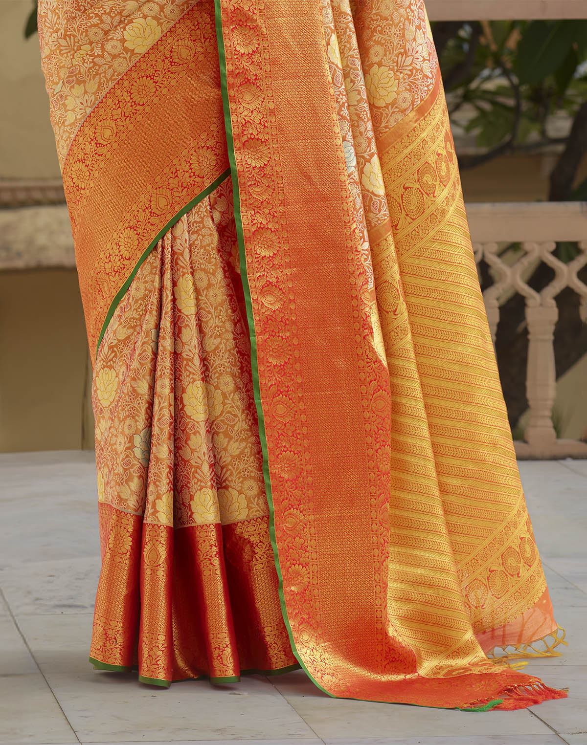 Orange and Green Floral Design Pure Silk Saree With Self Border