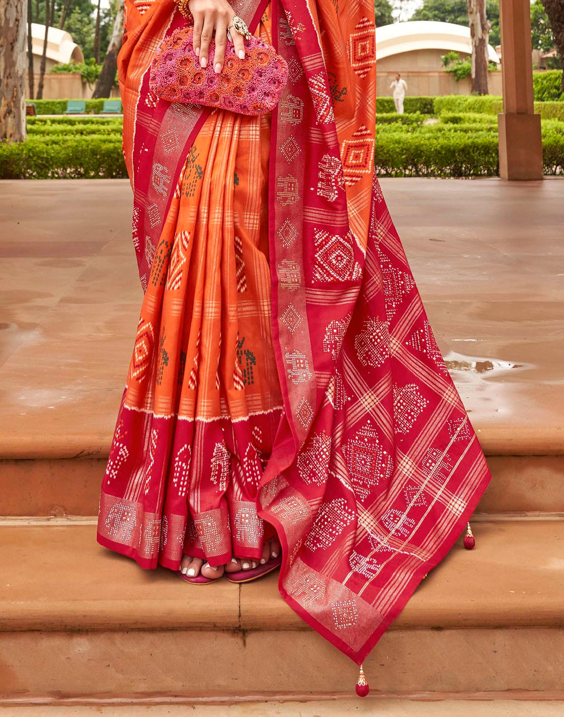 Orange Patola Silk Contrast Border Saree