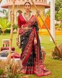 Alluring Black Patola Silk Floral Print Saree