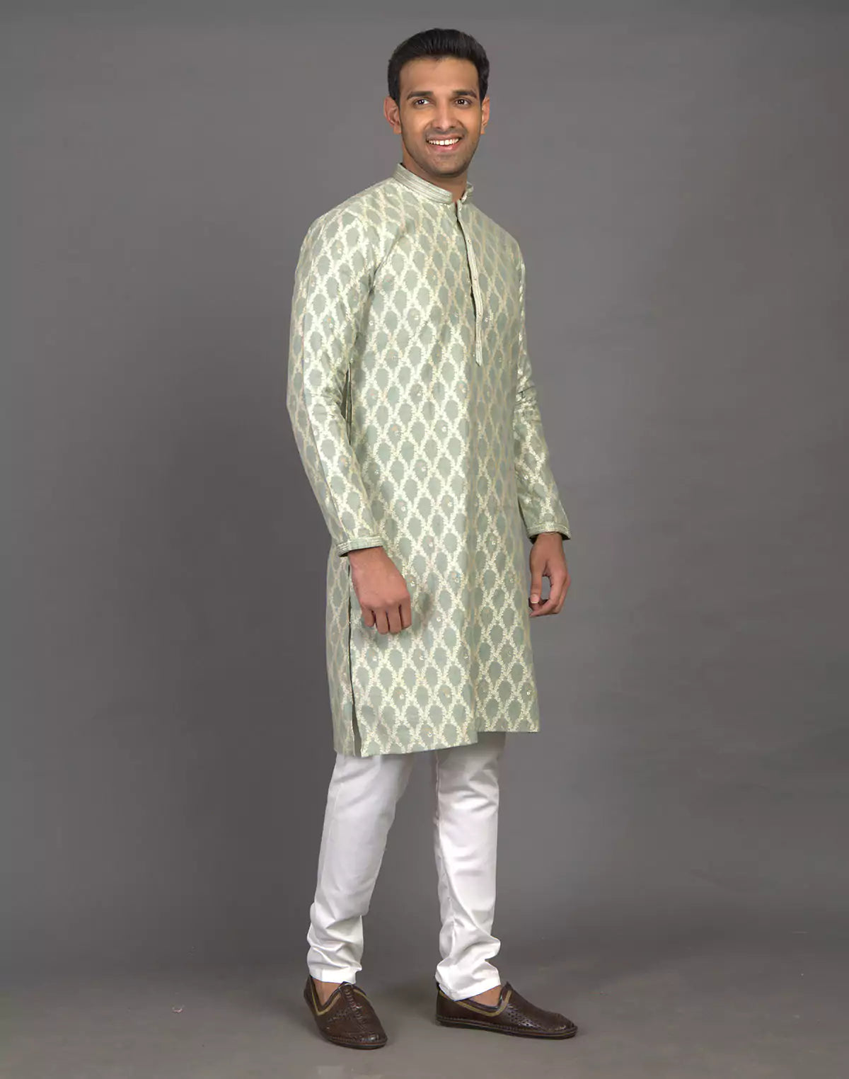 All Over Floral Weaving work Elegant Green Kurta Pyjama Set
