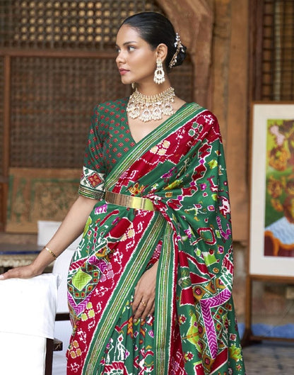 Stunning Green Coloured Ikat Patola Silk Saree