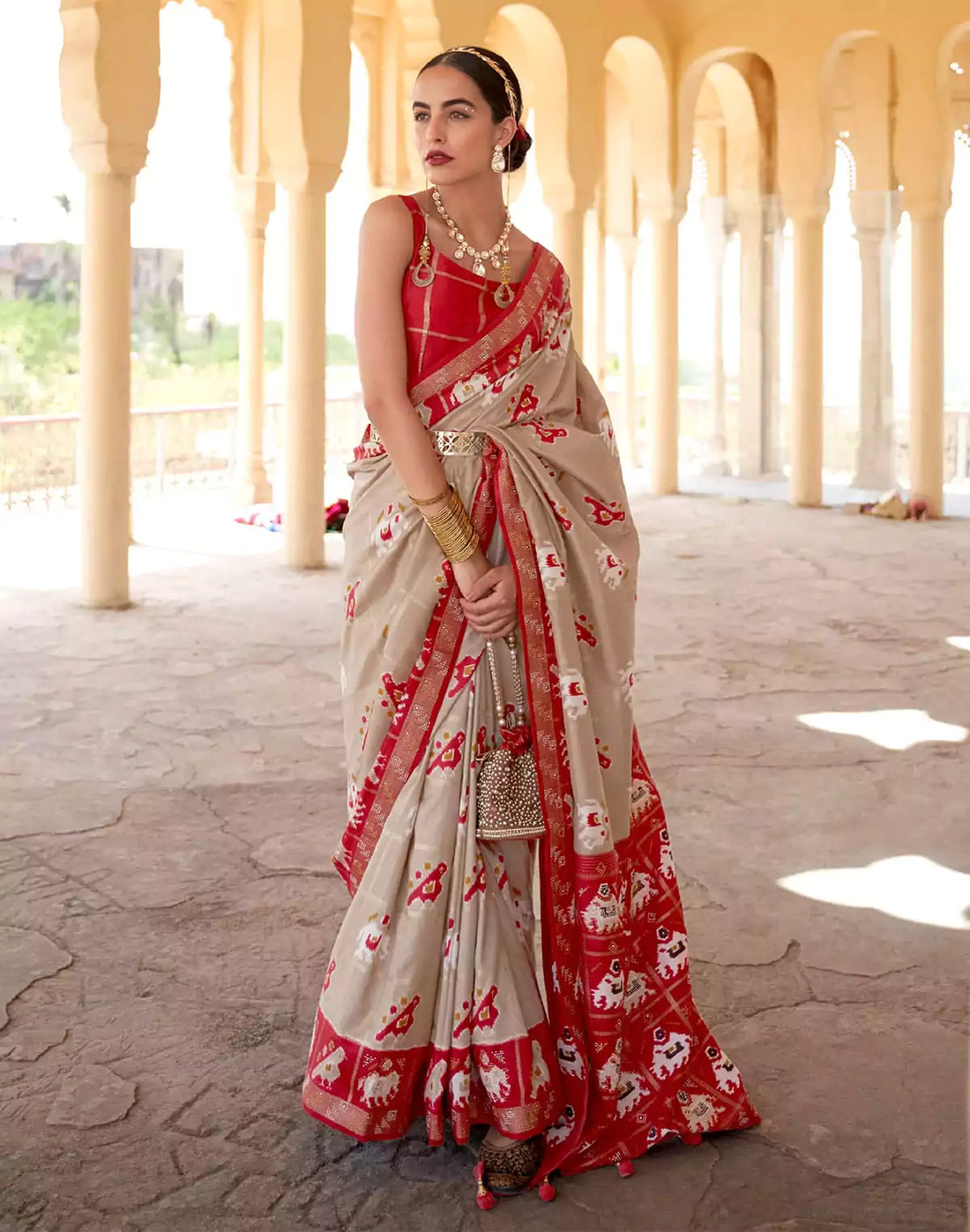 Elegant Beige Woven Design Patola Saree