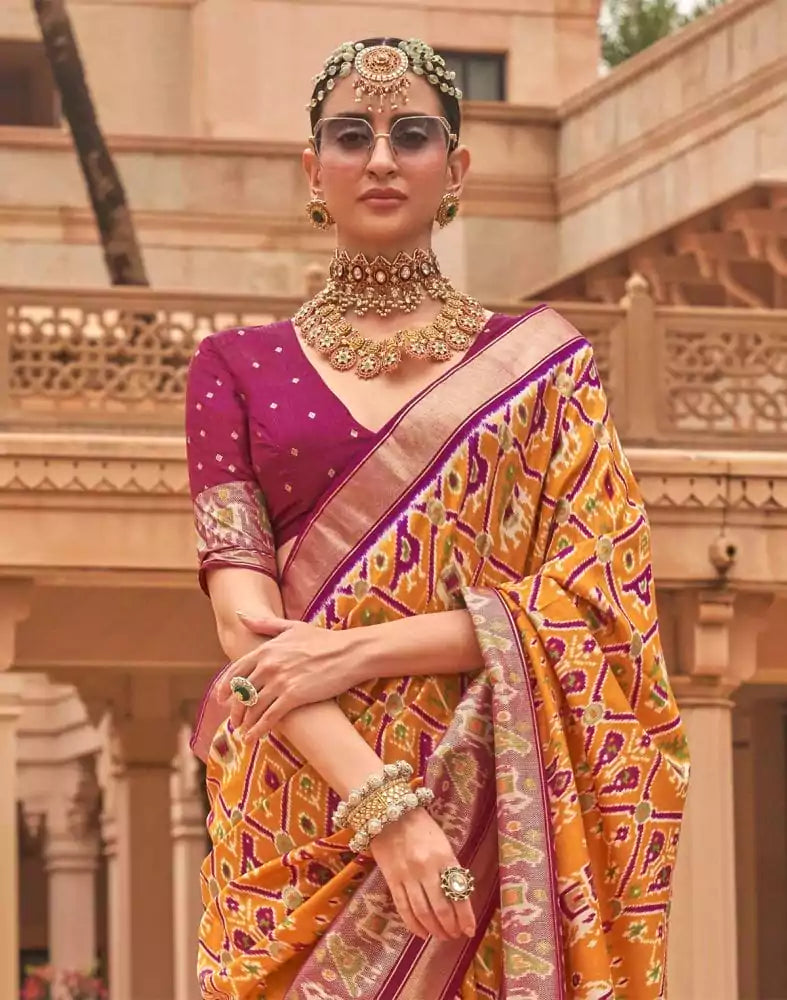 Mustard and Pink Ikat Print Patola Silk Saree