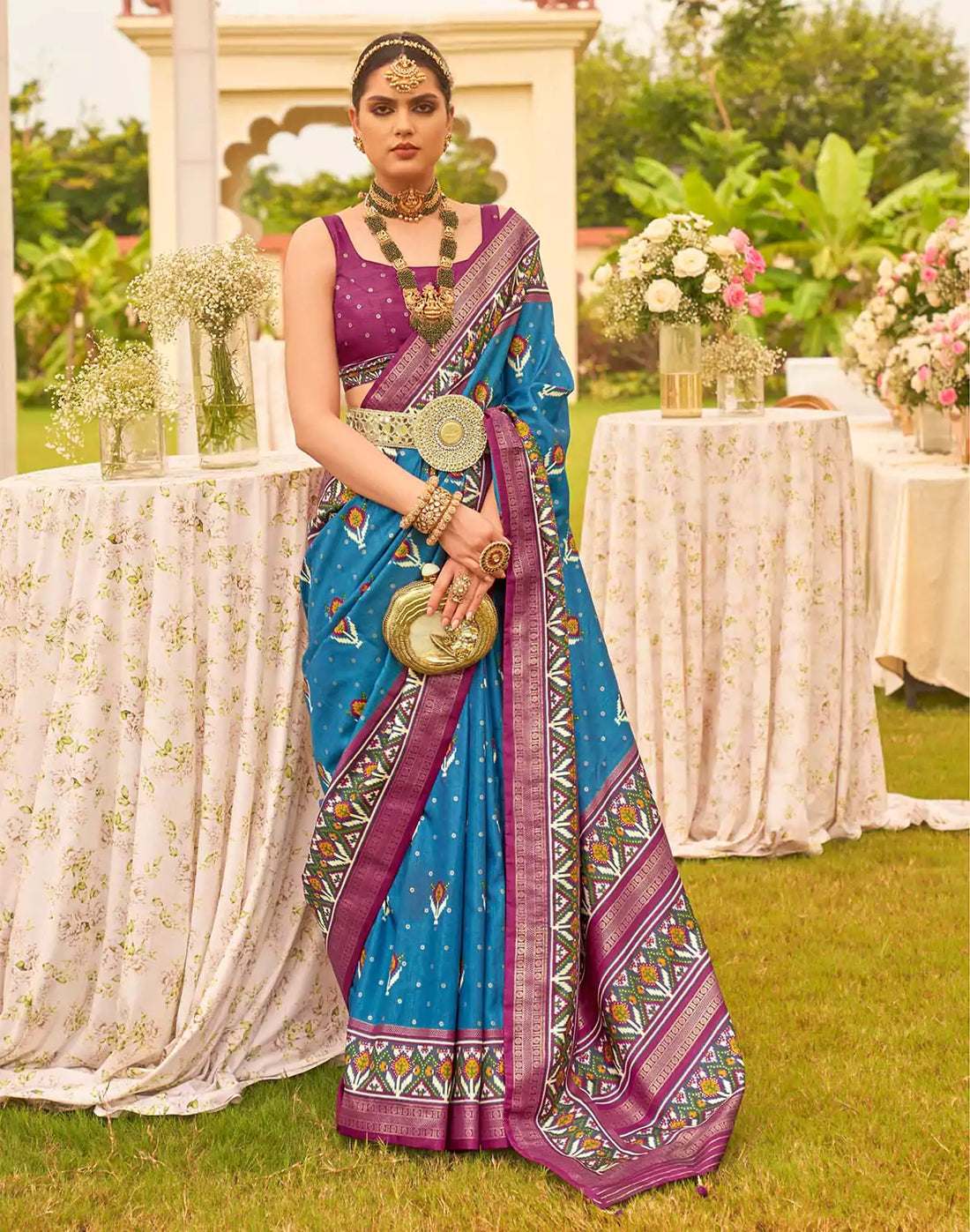 Captivating Blue Patola Silk Floral Festive Wear Saree