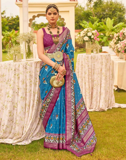 Captivating Blue Patola Silk Floral Festive Wear Saree